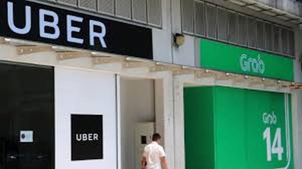 Grab and Uber fined a total of $13m by Singapore authorities